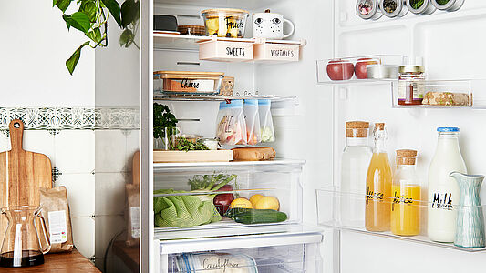 organised fridge with clearly labeled drawers and food containers